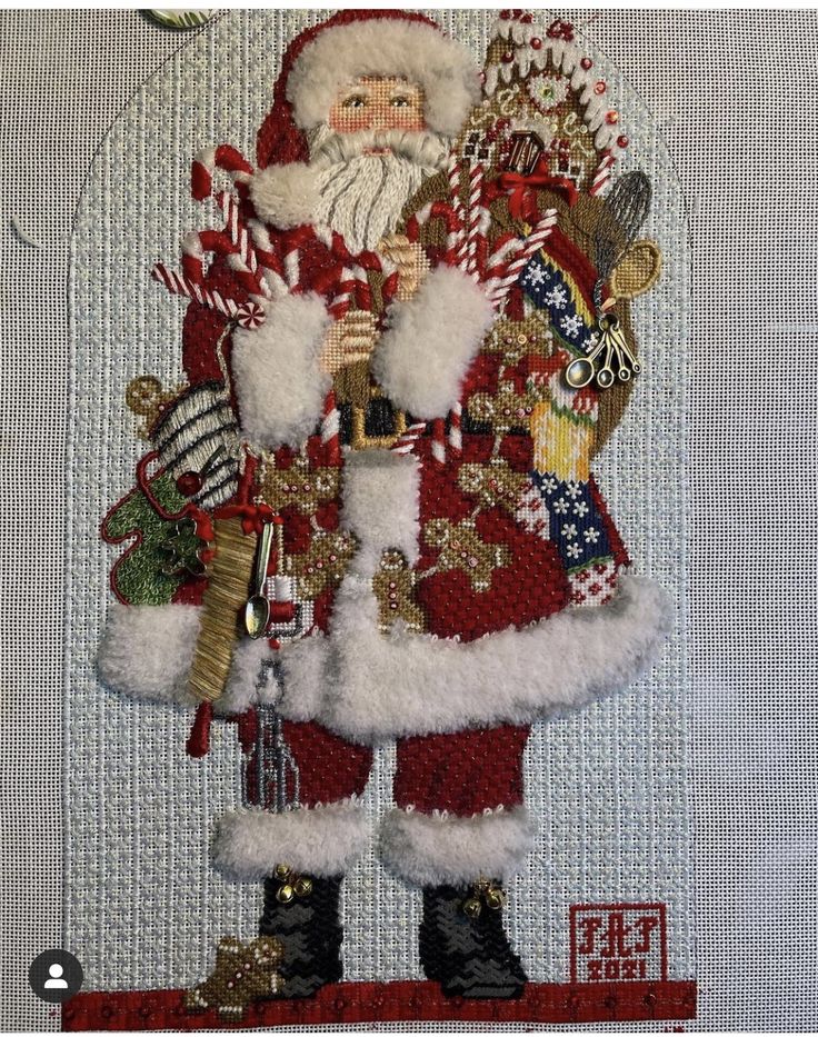 a santa clause with lots of christmas decorations