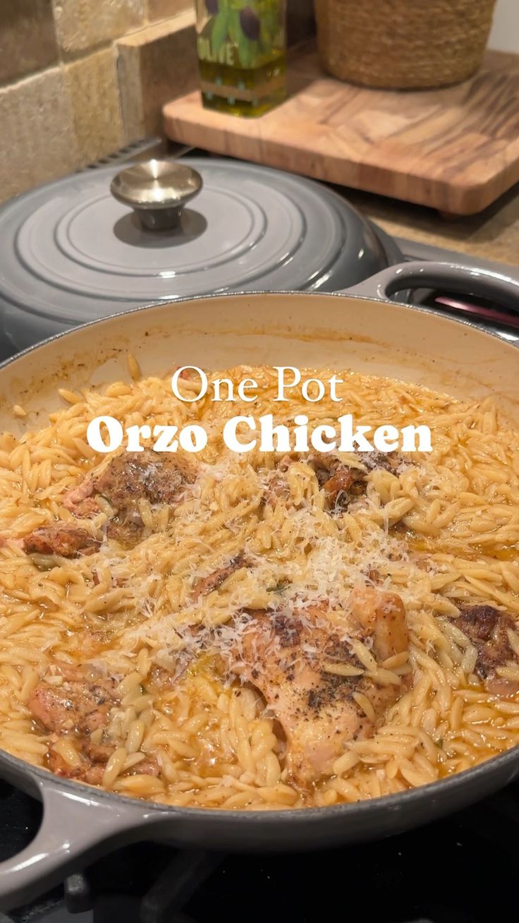 one pot orzo chicken in a skillet on the stove with text overlay