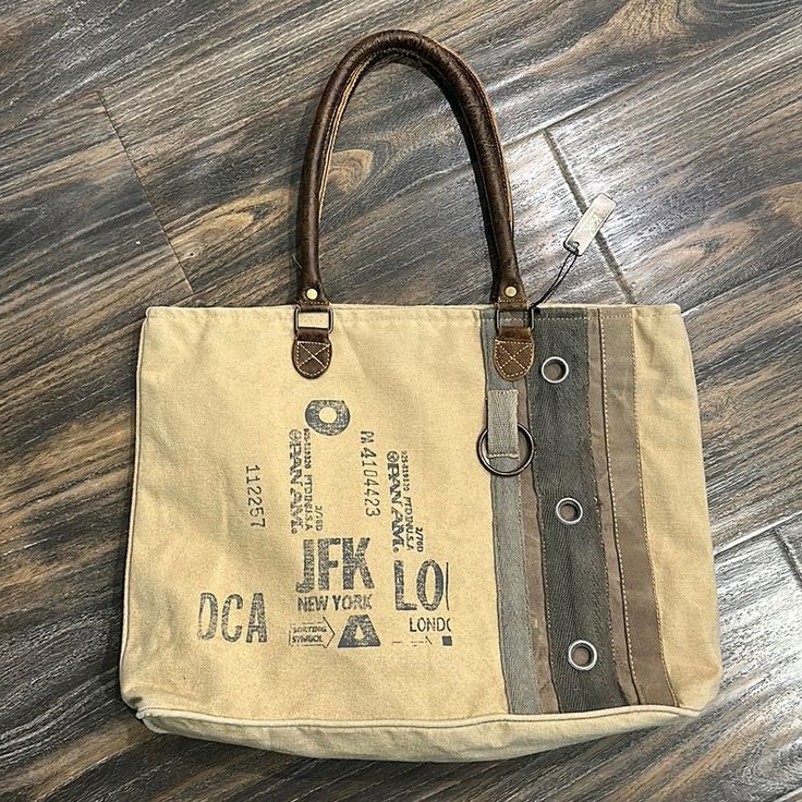 a purse sitting on top of a wooden floor