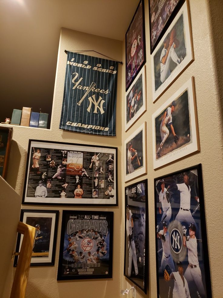 a wall filled with baseball memorabilia and pictures