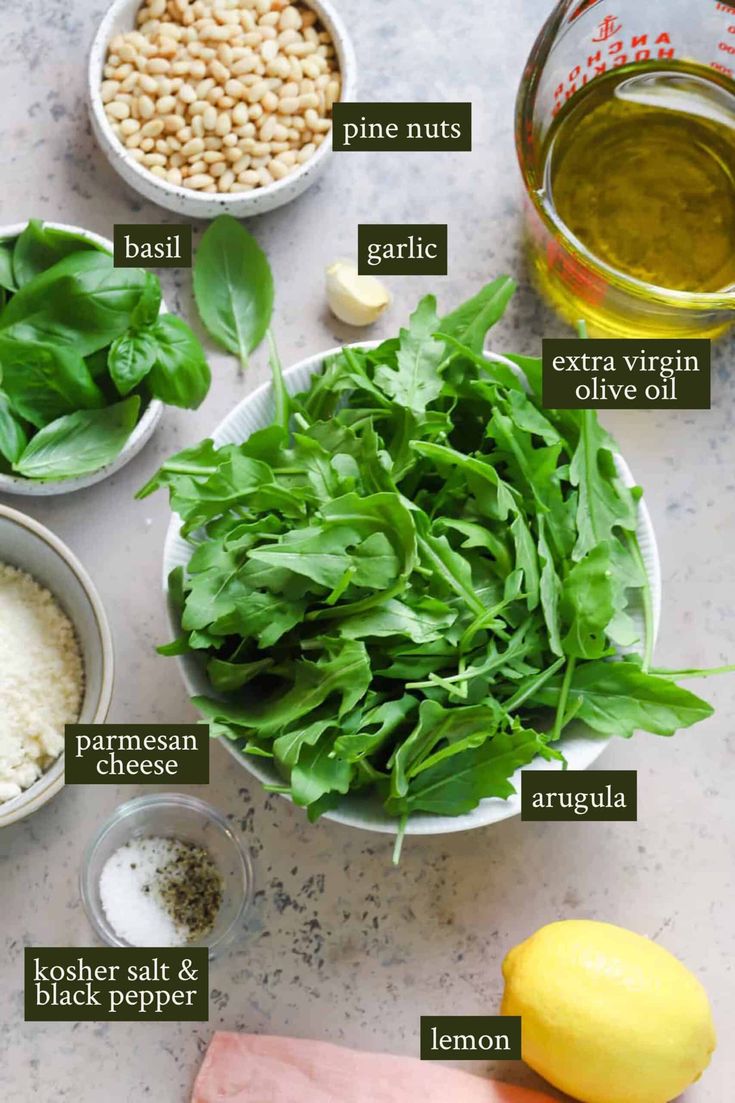 ingredients to make spinach salad laid out on a table