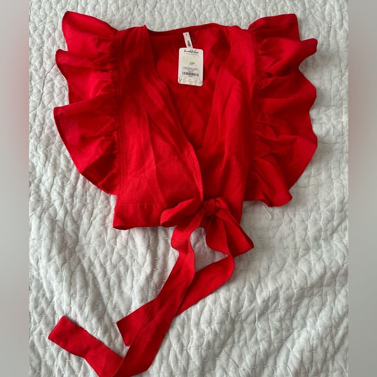 Nwt Red Flutter Sleeve Top Never Worn Red Ruffled Blouse For The Beach, Red Flutter Sleeve Tops For Spring, Red Ruffled Blouse For Summer, Red Ruffled Blouse For Vacation, Red Flutter Sleeve Blouse For Summer, Casual Red Blouse With Flutter Sleeves, Red Ruffled Tops For Vacation, Red Ruffled Beach Blouse, Red Ruffled Top For Beach