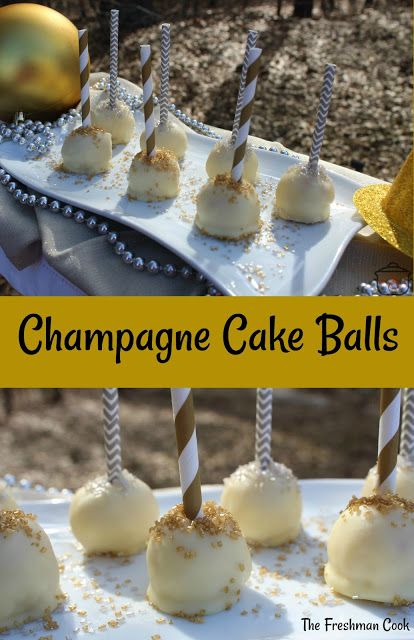 champagne cake balls on a tray with candles in the middle and an ornament hanging from them