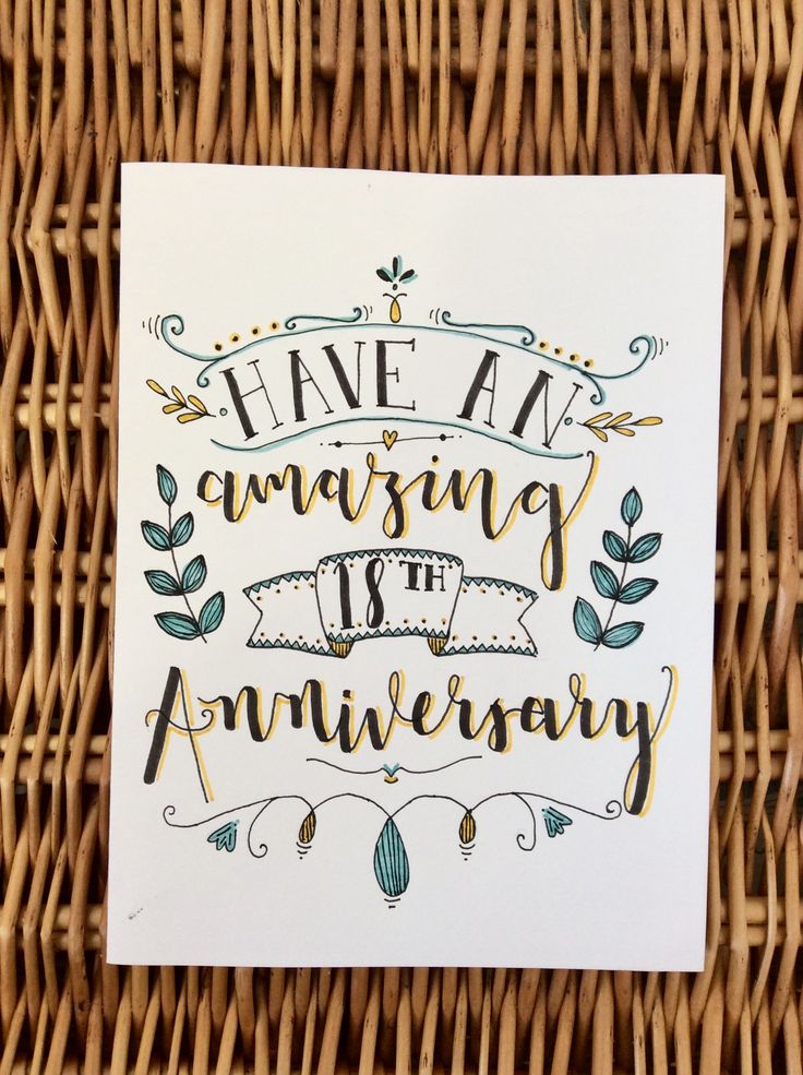 a card with the words have an amazing anniversary written on it in gold and green