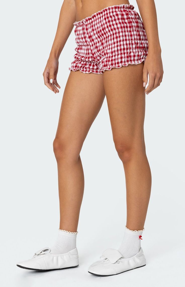 Online only! The Gingham Scrunch Shorts from Edikted feature tiered elastic scrunch detailing and a playful gingham pattern. Perfect for adding a touch of fun to your summer wardrobe!


	Shorts
	Tiered elastic scrunch
	Gingham pattern
	Polyester
	Model wears size S
	Model height is 5'8
	Item care: Wash with similar color Gingham Aesthetic, Scrunch Shorts, Bloomer Shorts, Slim Fit Cargo Pants, Bloomers Shorts, Gingham Pattern, Swimwear Dress, Jeans Kids, Kids Swimwear