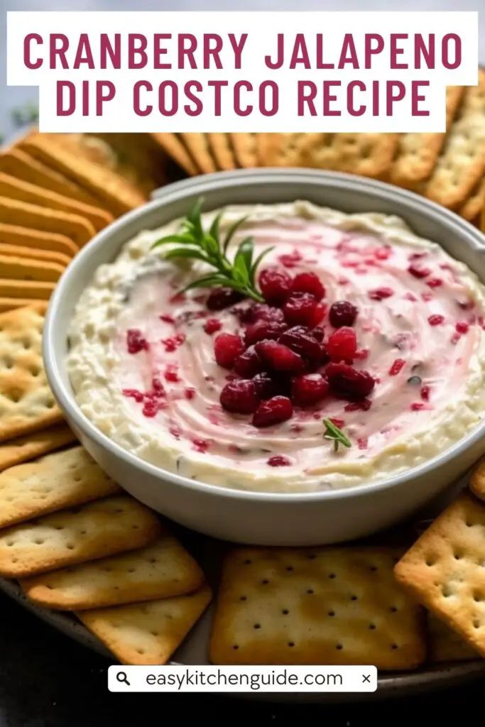 cranberry jalapeno dip in a white bowl surrounded by crackers