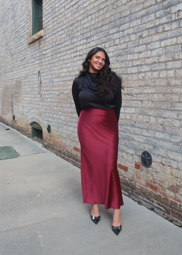 PRODUCT DETAILS: Burgundy maxi skirt Solid satin, not see through Elastic waistband with stretch No slits True to size Model is wearing a size Medium Model Info: Height: 5'6", Bust: 41", Waist: 34, Hips: 41" MEASUREMENTS: Small Waist: 14", Hips: 19", Length: 42" Medium Waist:15", Hips: 20", Length: 42" Large Waist: 16", Hips: 21", Length: 43" Satin Burgundy Skirt Outfit, Plus Size Burgundy Outfit, Burgundy Plus Size Outfits, Burgundy Satin Skirt, Burgundy Silk Skirt Outfit, Plus Size Satin Skirt Outfit, Burgundy Satin Skirt Outfit, Maroon Outfit Ideas, Red Midi Skirt Outfit