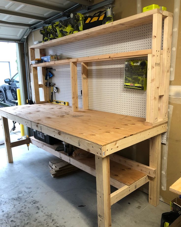 a workbench made out of wood in a garage