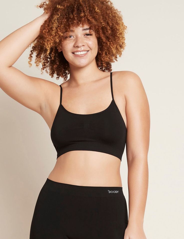 PRODUCT DETAILS Our Cami Bralette is a soft, seamfree design that is designed with ribbed detail to flatter and contour. Its soft, thin, fabric straps and wide ribbed band provide all-day comfort, perfect to wear under camis and tank tops. Our Cami Bralette is wireless, has no padding, is double-layered for extra coverage and provides you with low support. Our seamfree design means that there is no fabric wastage or off-cuts. We have done away with tricky fastenings, clips and hooks and have cra Active Tights, Fast Fashion Brands, Fashion Revolution, Sleep And Loungewear, Triangle Bralette, Black Bralette, Bra Women, Fast Fashion, Cropped Leggings