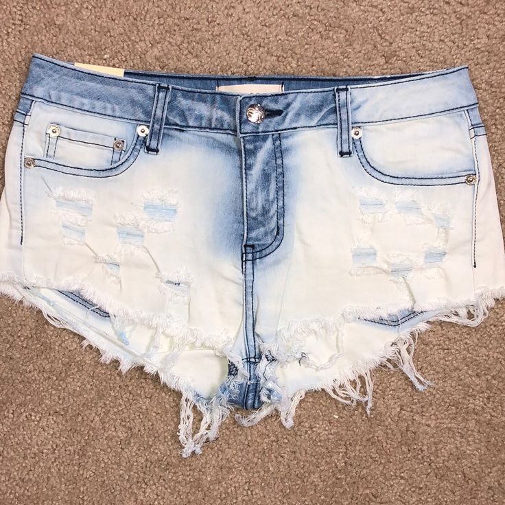 Newdistressed Jean Shorts Never Worn...Summer Ready Fast Shipper White Jeans For Beach In Summer, White Summer Jeans For Beach, Summer Distressed Jean Shorts, Casual Distressed Jeans For Beach, Ripped Jeans For Beach In Summer, Summer Beach Ripped Jeans, Ripped Cutoff Bottoms For Vacation, White Jean Shorts With Frayed Hem For Beach, Beach White Jean Shorts With Frayed Hem