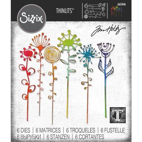 six different colored metal flowers are shown in this package, with the words sizzix on