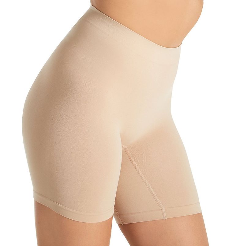 Designed for a seamless fit and full coverage under clothing, this slip short is the perfect solution for a smooth look. Made from nylon and spandex. Wide, double-layer rib-knit waistband keeps the top in place. High rise provides more tummy coverage. Crotch gusset panel guides the fit for no gaps between the legs. Designed for light, all over smoothing. Seamless rear. Long legs have wide, seamless hems to prevent roll up. Protects against inner thigh chafing. Ribbed knit zone at crotch for brea High Stretch Smoothing Solid Shorts, High Stretch Smoothing Solid Color Shorts, High Stretch Smoothing Shorts, High Stretch Solid Color Smoothing Shorts, Seamless Shaping Shapewear Mid-thigh Length, Solid Smoothing Shapewear Biker Shorts, Seamless Mid-thigh Shapewear, Smoothing Shapewear Biker Shorts, Seamless Compression Shapewear Mid-thigh Length