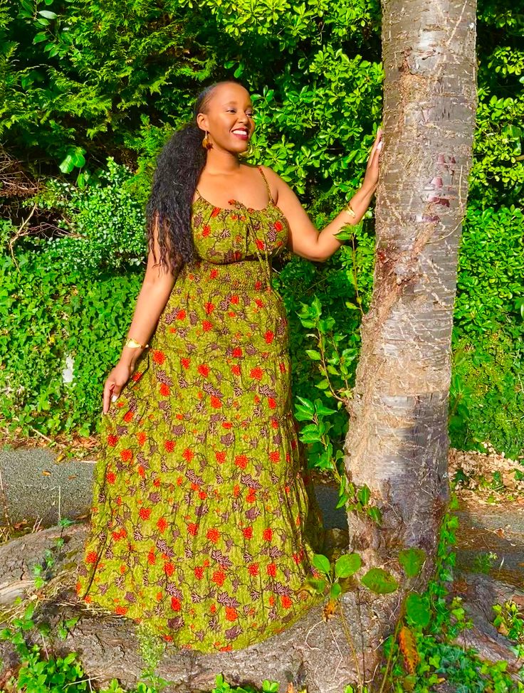 A cute maxi sun dress in a floral print with green being the dominating colour. It has smock at the waist and adjustable straps at the bust to help cinch you in whatever your bust size. A great dress for a relaxed but chic look on warm days. Can be worn with a denim jacket and trainers, sandals or slippers. Style your way! Handmade in Ghana. 100% cotton. Find the Fulani earrings and bangles in the shop. Search “Fulani”. YOU CHECKED YOUR MEASUREMENTS AGANST THE SIZE CHART FOR THIS SHOP? Although Green Long Sundress For The Beach, Green Long Sundress For Beach, Green Maxi Sundress For Summer, Green Maxi Length Summer Sundress, Green Spaghetti Strap Dress With Smocked Bodice, Green Dress With Smocked Bodice And Spaghetti Straps, Green Strapless Sundress For Summer, Green Maxi Sundress With Adjustable Straps, Green Long Sundress For Summer