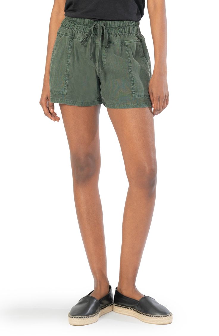 Perfectly comfy yet still polished, these relaxed-fit shorts are fashioned from lightweight woven fabric with an elastic waist and chino-style pockets. 4" inseam; 24" leg opening; 11" front rise; 16" back rise (size Medium) Elastic/drawstring waist Front patch pockets; back button-flap patch pockets 50% linen, 48% rayon, 2% spandex Machine wash, line dry Imported Women's Clothing Chinos Style, Elastic Waist Shorts, Workout Shorts, Drawstring Waist, Clothing Items, Woven Fabric, Casual Shorts, Elastic Waist, Women's Clothing