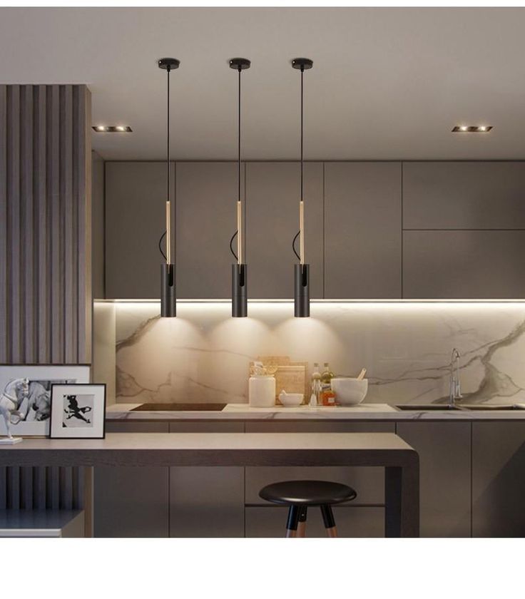 an image of a kitchen setting with modern lighting