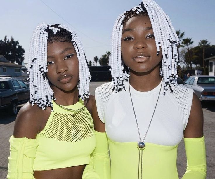 two young women standing next to each other