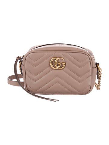 #GUCCI | Nude matelassé leather Gucci Marmont Mini bag with gold-tone hardware Gucci Marmont Mini Bag, Pink Gucci Purse, Gg Marmont Matelassé Mini Bag, Black Gucci Purse, Gucci Marmont Mini, Mini Chain Bag, Gucci Crossbody Bag, Gucci Purses, Vintage Crossbody Bag