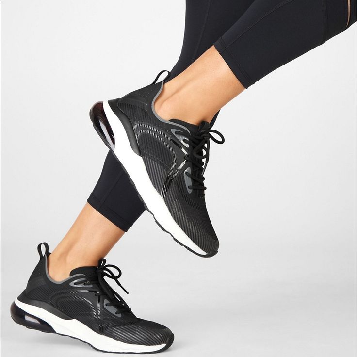 Size 10 Brand New! Kick Your Workout Into High Gear In This Performance Sneaker With A Breathable Knit Upper And Cushioned Arch Support. Lace-Up Style Removable Insole Textile And Synthetic Upper/Textile Lining/Synthetic And Rubber Sole Black Stretch Synthetic Sneakers, Sporty Stretch Synthetic Sneakers, Athleisure Stretch Sneakers In Synthetic Material, Athleisure Stretch Sneakers With Synthetic Material, Athleisure Stretch Synthetic Sneakers, Casual Sneakers With Arch Support For Gym, Comfortable Black Sneakers For Light Exercise, Black Gym Sneakers With Arch Support, Casual Sneakers With Air Cushioning For Gym