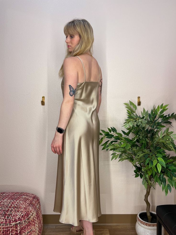 A beautiful gold slip dress, in a thick satin material, that shimmers and shines with movement. A beautiful dress for a wedding, rehearsal dinner, or cocktail party. Champagne Gold Silk Slip Dress V-Neckline, double layer fabric over bust Heavy Satin Material Champagne Slip Dress, Gold Slip Dress, Party Champagne, Dress For A Wedding, Wedding Rehearsal Dinner, Shimmer N Shine, Silk Slip Dress, Gold Silk, Wedding Rehearsal