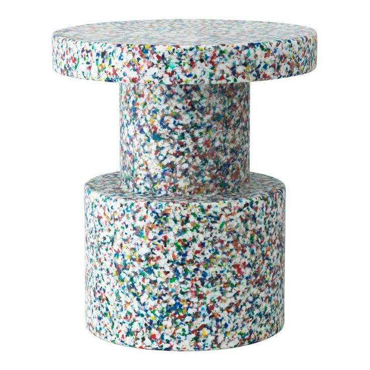 three stacked sprinkles on top of each other in different colors and sizes