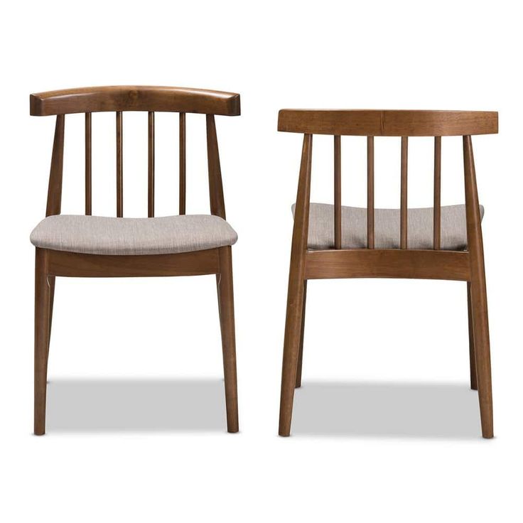 two wooden chairs side by side on a white background