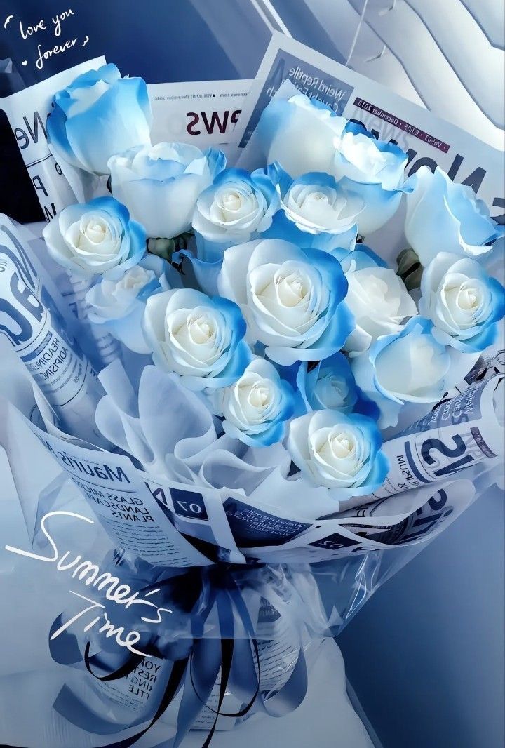 a bouquet of white and blue roses on display