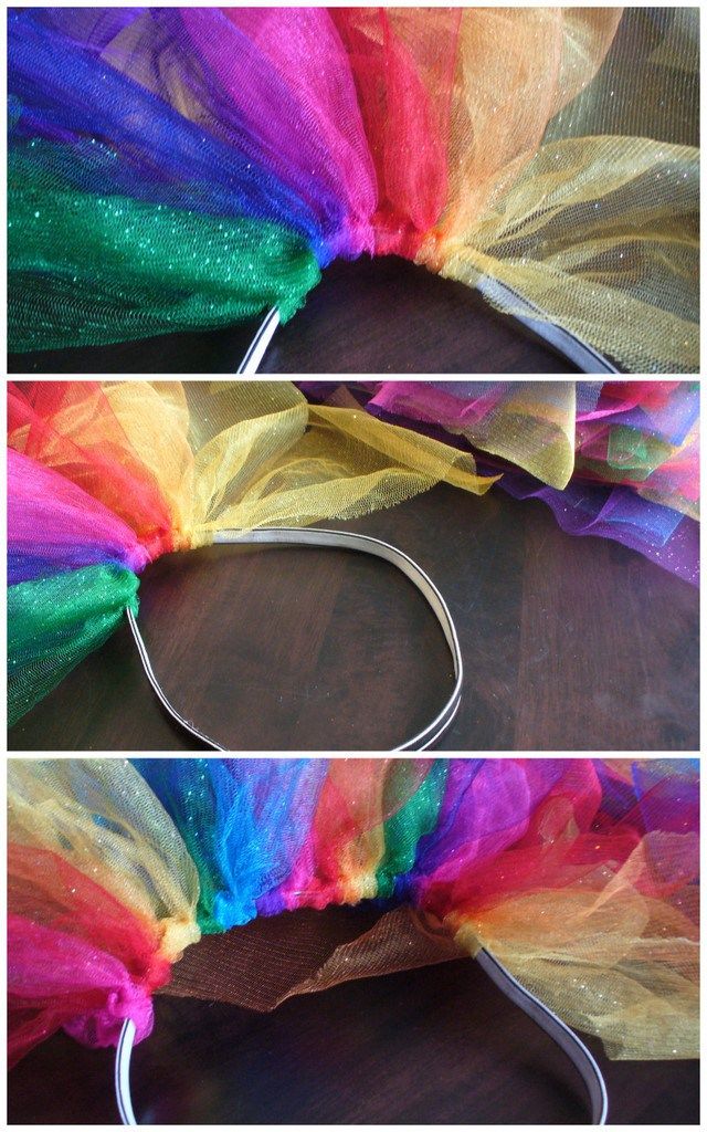 there is a rainbow colored tulle on top of the headband and it looks like something out of a fairy tale