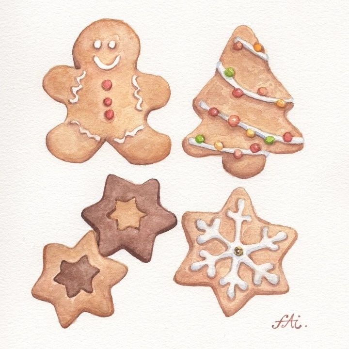 four different types of decorated cookies on a white surface