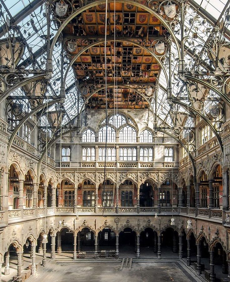 the inside of an old building with lots of windows