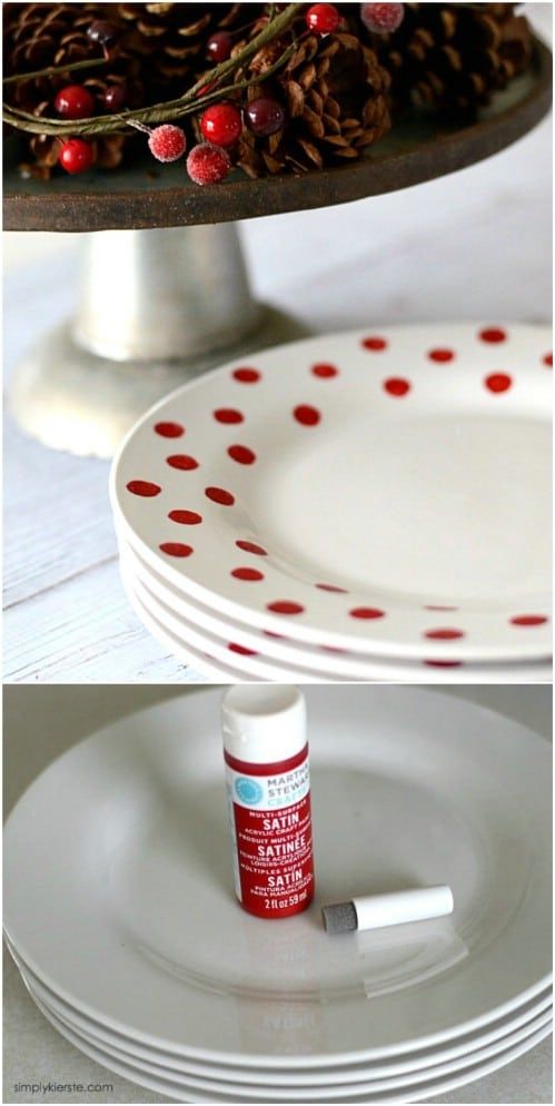 a white plate with red polka dots and a bottle of paint sitting on top of it