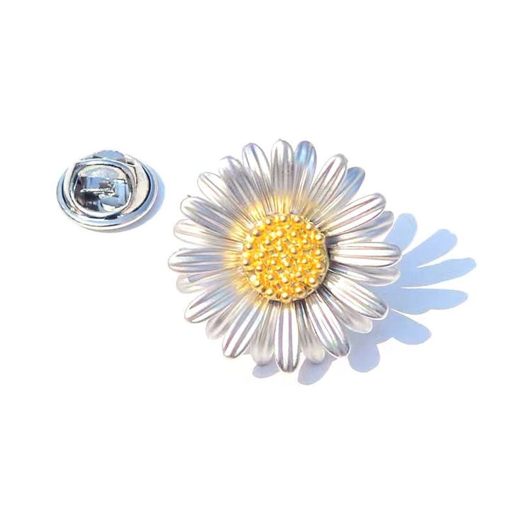 Look presentable and stylish with a Flower Brooch! This decorative accessory, often worn on the lapel of a dress or blouse, is sure to add some sparkle and life to any ensemble. The Flower Brooch has long been a symbol of elegance and sophistication. It comes in many shapes and sizes, from simple designs featuring enamelled flowers to intricate designs featuring gemstones, gold filigree, and delicate seed pearls. In some cultures, Flower brooches are used as symbols of luck or protection. Some F Fairy Brooch, Mary Queen Of Scots, Expensive Clothes, Elegant Flowers, Gold Filigree, Seed Pearl, Intricate Designs, Classic Beauty, Love Symbols