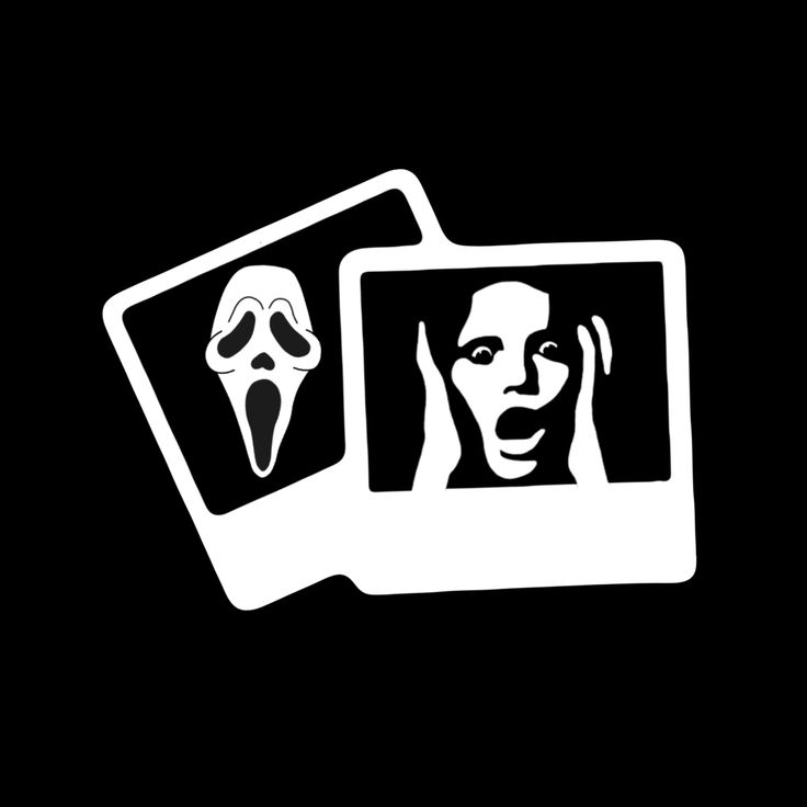 two playing cards with the faces of people in black and white, on a dark background