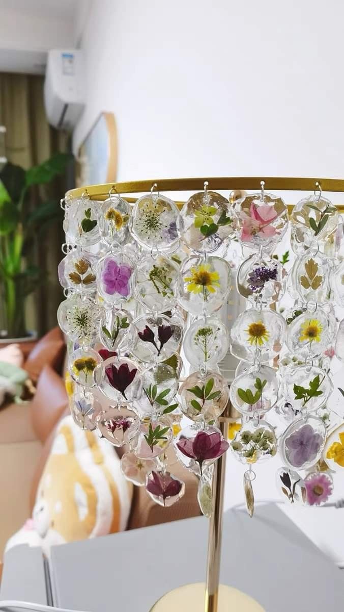 a lamp with many different flowers on it