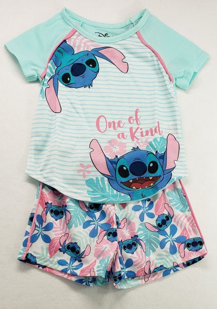 Disney Stitch "One Of A Kind" 2-Piece Pajama Set Girls' Size 4/5 Brand new with tags Smoke free home The galaxy's most adorable alien pet adds a one-of-a-kind touch to her sleepwear with this  Stitch 2-Piece Pajama Set, featuring cute Stitch print pj shorts and a cozy sleep shirt. 2-piece sleep set includes: 1 sleep shirt and 1 pair of shorts Tee: Crewneck; short sleeves;  Stitch graphic print Shorts: Pull-on styling; elastic waistband; Stitch print  Flame retardant  ©Disney, All Rights Reserved Cute Bedtime Sets With Character Print, Cute Sets With Character Print For Playwear, Cute Playwear Sets With Character Print, Cute Character Print Playwear Sets, Cute Sleepover Sets With Character Print, Playful Green Sets With Character Print, Cute Multicolor Sets For School, Cute Multicolor School Sets, Stitch Shorts