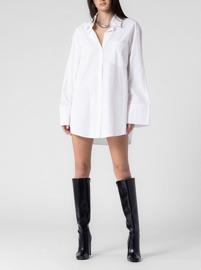 100% Cotton Shirt Dress Light weight Can be worn as a shirt and dress Fit over sized Front pocket detail Model is wearing a size Small/Medium Model Measurements: Height 5'8 / Waist 27 / Hips 29 Please refer to the care label for garment care instructions Affordable White Trendy Shirt Dress, Cheap White Shirt Dress For Fall, White Knee-length Shirt Dress, Vintage White Shirt Dress, Cheap White Fitted Shirt Dress, Cheap Fitted White Shirt Dress, Cheap White Mini Shirt Dress, Cheap White Shirt Dress For Day Out, Affordable White Fitted Shirt Dress