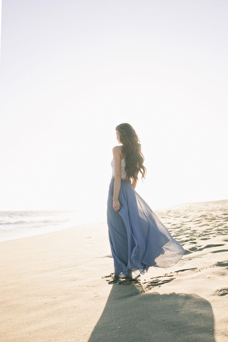 Our best selling maxi skirt now comes in this gorgeous (and exclusive!) Slate Blue color! We're obsessed with this perfect year-round color, and the flowy silhouette of this closet essential. Trust us when we say that you need one in every color! This skirt is so versatile and can be dressed up with a lace top for a wedding, engagement photo shoot, bridesmaids, or date night, or dressed down with a cute crop top or sweater for everyday wear! Chic Maxi Dress With Tulle Skirt For Summer, Chic Summer Maxi Dress With Tulle Skirt, Breezy Flowy Maxi Skirt With Ruffles, Spring Prom Maxi Skirt With Ruffles, Summer Prom Maxi Dress With Tulle Skirt, Flowy Tulle Maxi Skirt For Summer, Tiered Maxi Skirt For Summer Prom, Summer Tiered Maxi Skirt For Prom, Flowy Tiered Maxi Dress For Wedding