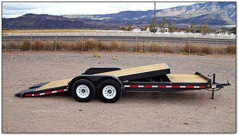 a trailer that is sitting in the dirt