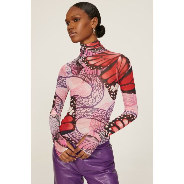 Pink printed mesh (95% Polyester, 5% Spandex). Top. Long sleeves. Turtleneck. Pull on. 23.5" from shoulder to hemline. Imported. Trendy Fitted Mesh Top For Fall, Unique Turtleneck, Trendy Fitted Mesh Top With Sheer Sleeves, Fitted Multicolor Fashion Print Tops, Fitted Tops With Sheer Sleeves For Winter, Fitted Graphic Print Mesh Top For Fall, Multicolor Long Sleeve Mesh Top For Fall, Stretch Mesh Top With Graphic Print For Fall, High Stretch Sheer Mesh Top For Spring