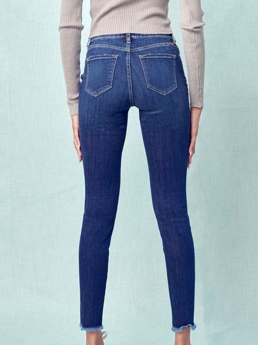 KanCan Mid Rise Ankle Skinny Ankle hem detail Rise: 9" Inseam: 27" Material: 64% Cotton 21% Polyester 12% Rayon 3% Spandex Medium Wash Elastane Bottoms For Spring, Dark Blue Denim, Lower Leg, Mid Rise Jeans, Split Hem, Winter Boots, Stretch Denim, Levi Jeans, Blue Denim