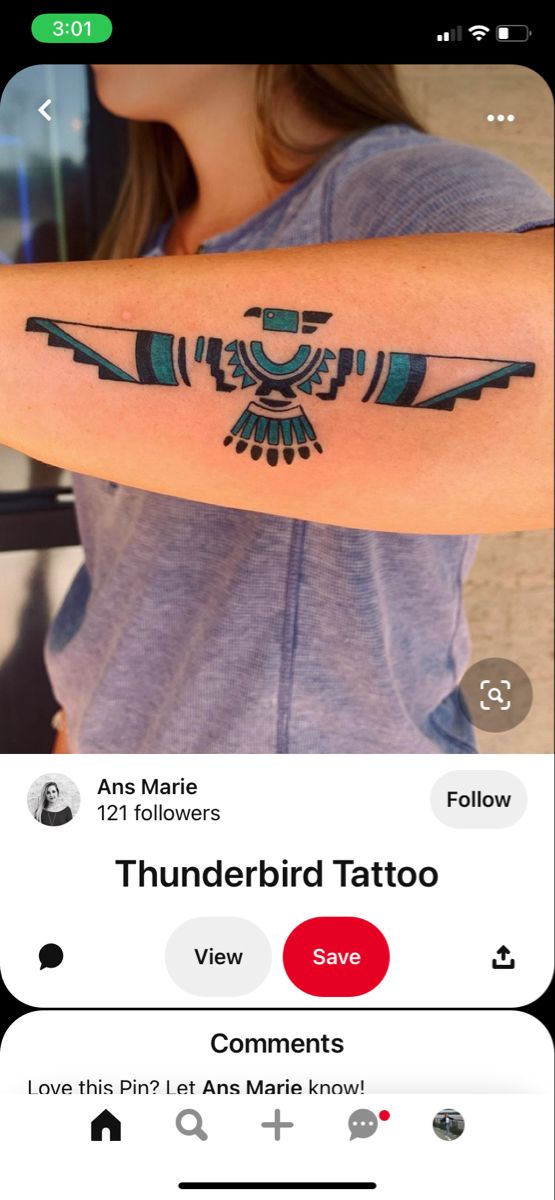 a woman with a tattoo on her arm and the words thunderbird tattoo above it