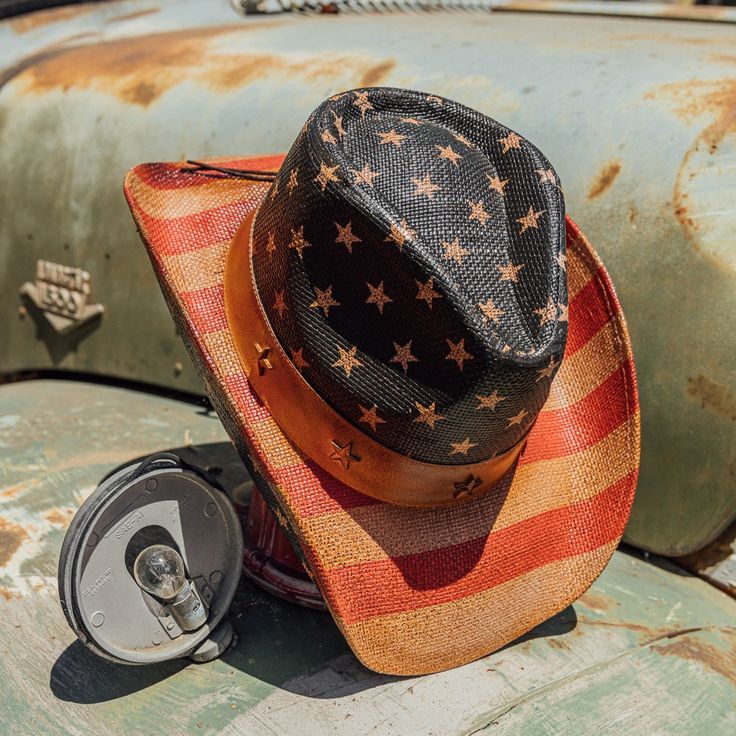 TX-704V from the Saddleback Collection is the perfect addition to your summer wardrobe. Crafted with genuine Toyo straw and genuine leather, this stylish hat features a shapeable wired brim and a 3.5 inch brim. Expertly adorned with a classic American flag pattern and star pins, this is a timeless piece that will elevate any look. Short Brim Straw Hat For Western-themed Events, Vintage Hats For Western-themed Summer Events, Straw Hat Bands With Short Brim For Rodeo, Retro Adjustable Hat For Rodeo, Americana Rodeo Hat With Curved Brim, Straw Sun Hat For Kentucky Derby And Rodeo, Retro Summer Hats For Country Events, Americana Curved Brim Hat For Rodeo, Kentucky Derby Straw Sun Hat For Rodeo