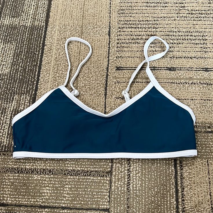 Essentially Fits Like A Sports Bra. This Is Brand New! The Color Is More Of A Green Blue Thank Pictures Show Sporty Blue Swimwear For Beach Season, Blue Sporty Tankini For Beach Season, Blue Summer Sports Bra, Blue Summer Sports Bra For Sports, Summer Blue Sports Bra, Sporty Blue Tankini For Beach Season, Blue Sports Bra For Summer Sports, Blue Sports Bra With Adjustable Straps, Blue Sporty Tankini For Summer