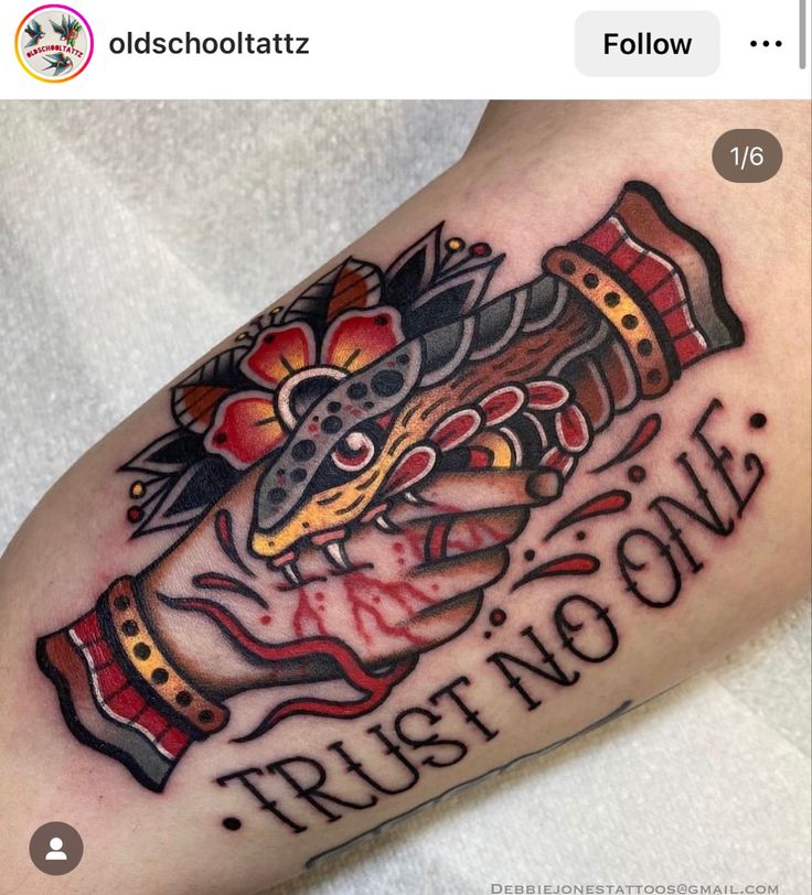 a tattoo on the arm that says trust love and an image of a snake with flowers