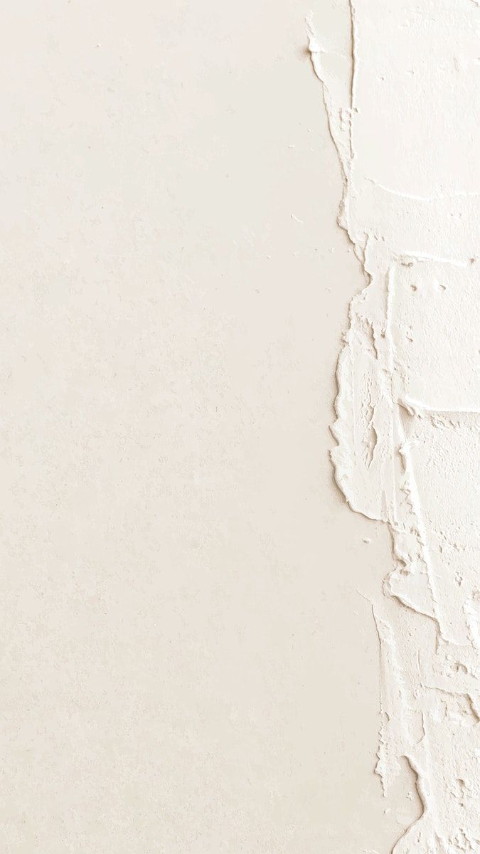 a white wall with peeling paint on it