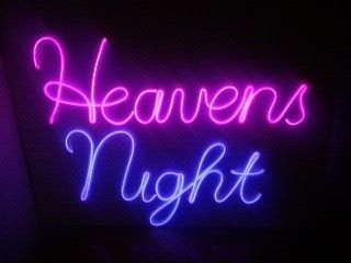 a neon sign that says heaven's night