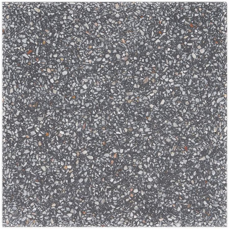 an image of a black and white surface with small rocks on it's sides