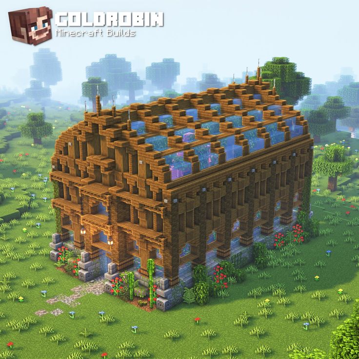 an image of a building made out of wood and glass in the middle of a field