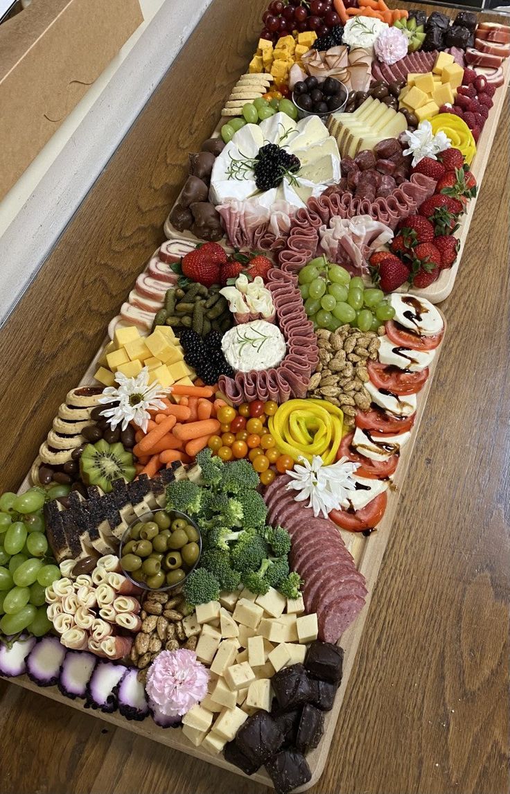 a long platter filled with lots of different types of food