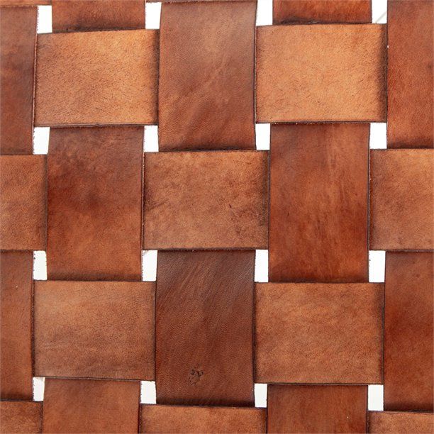 a close up view of a woven basket weave pattern made out of brown leather material