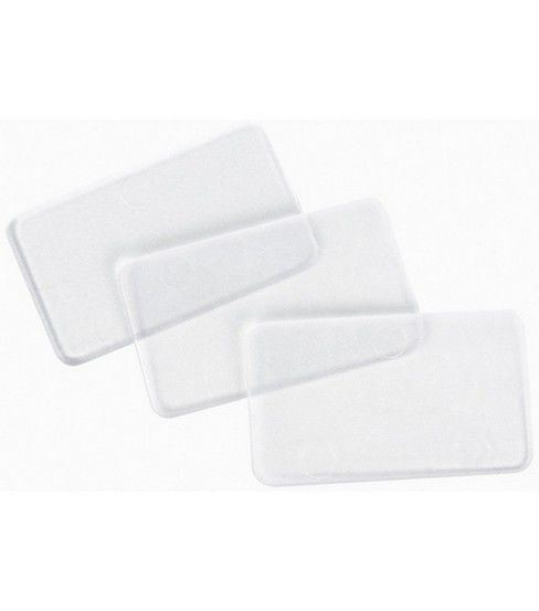 three white placemats on top of each other in front of a white background